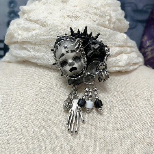 Spectral Hand Spiked Brooch