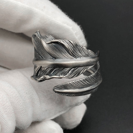 Silver Golden Feather Ring -   Sunro Raven