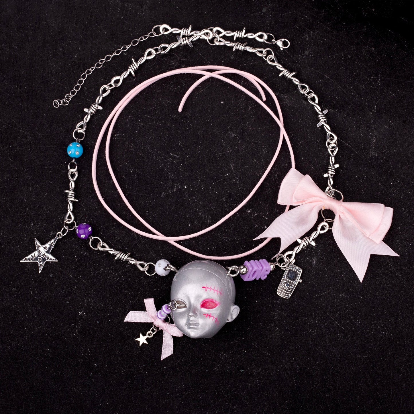 Bow Doll Head Necklace
