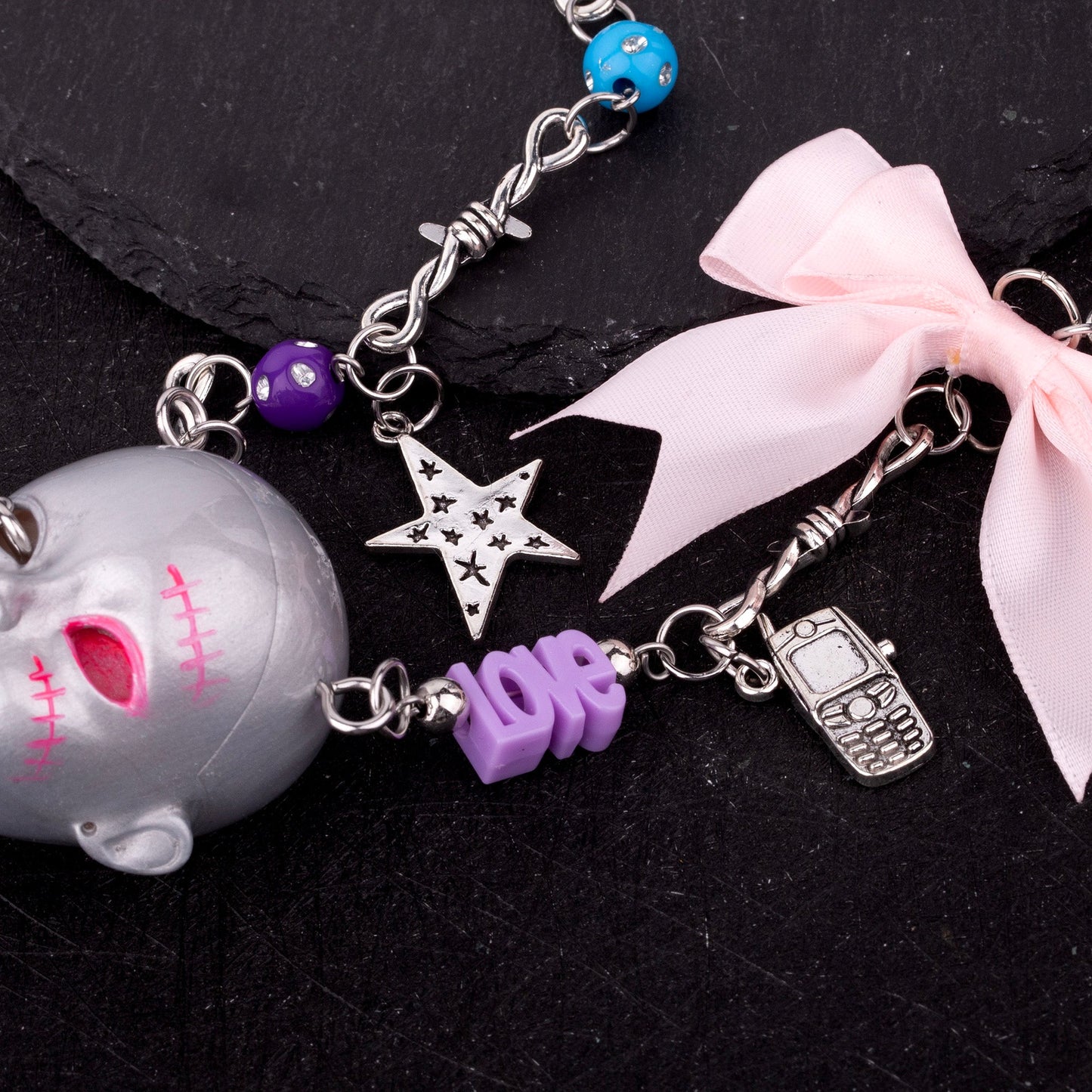 Bow Doll Head Necklace