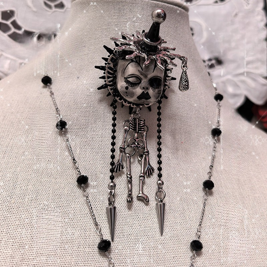 Jester Hat Doll Face With Skeleton Brooch