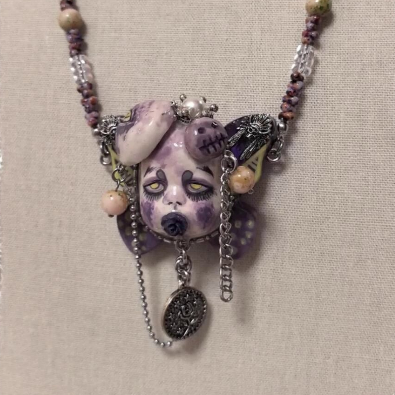 Muted Purple Sorrowful Doll Face Rose Coin Necklace