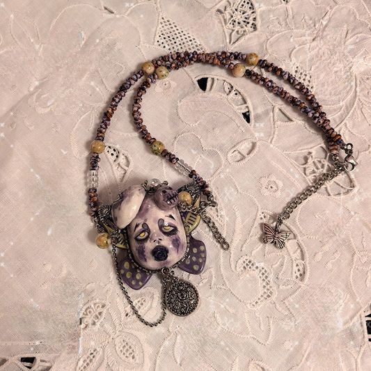 Muted Purple Sorrowful Doll Face Rose Coin Necklace