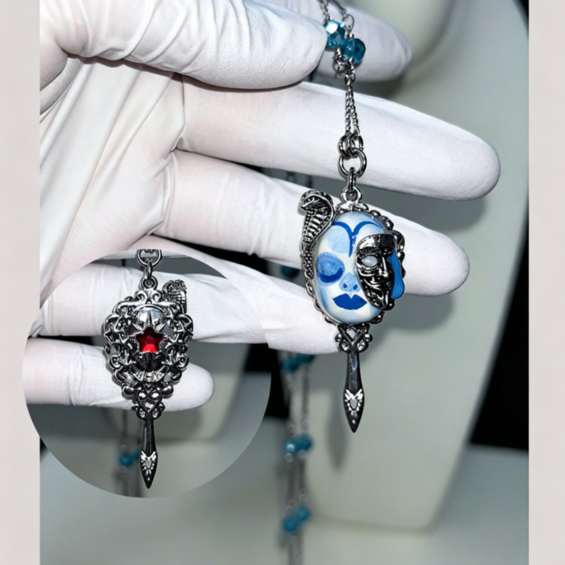 Mystical Cobra Eye Sword Dangle Earring