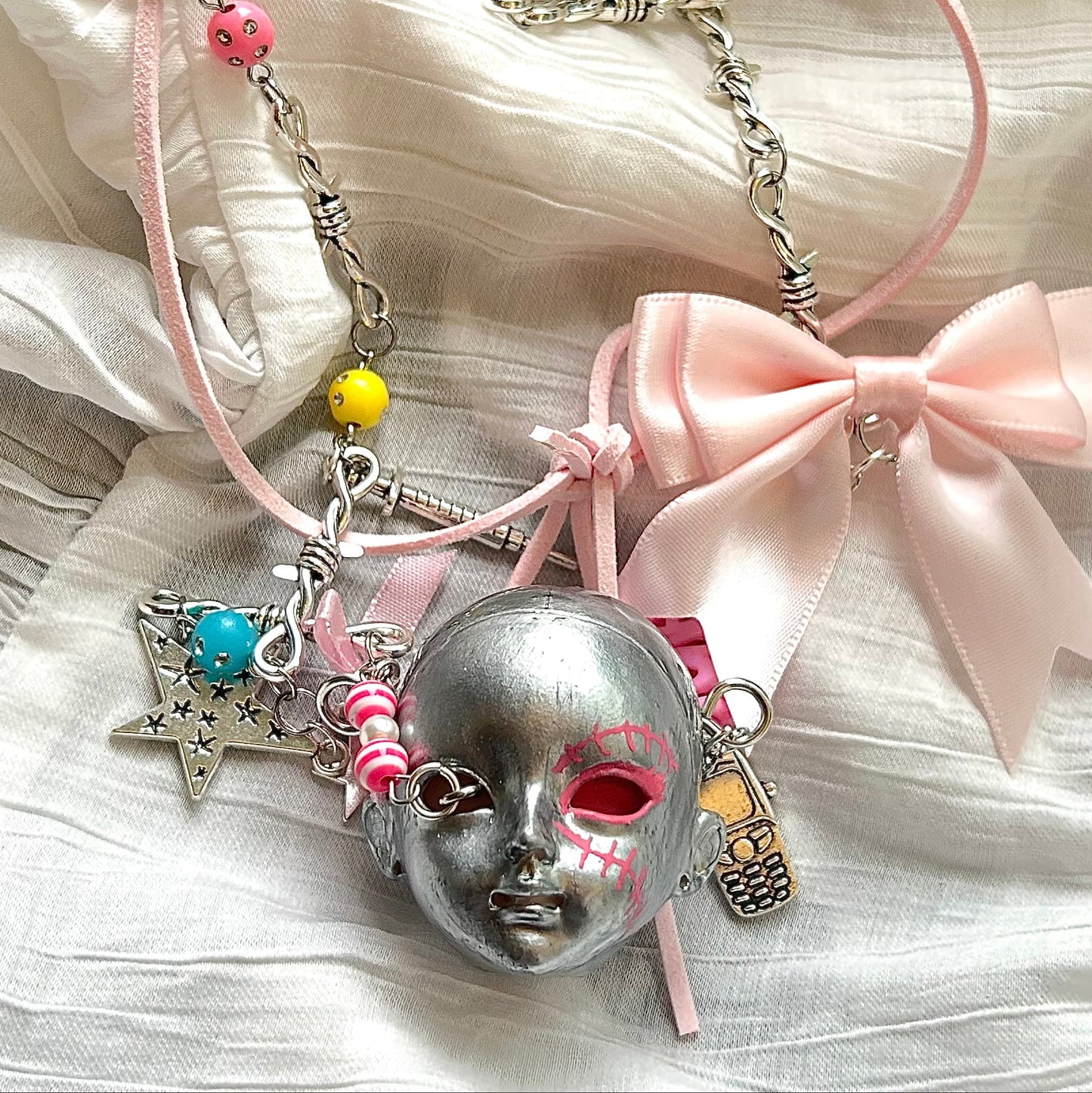 Bow Doll Head Necklace