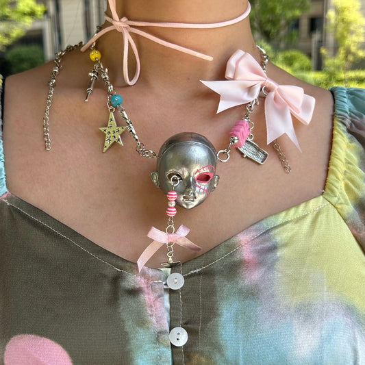 Bow Doll Head Necklace